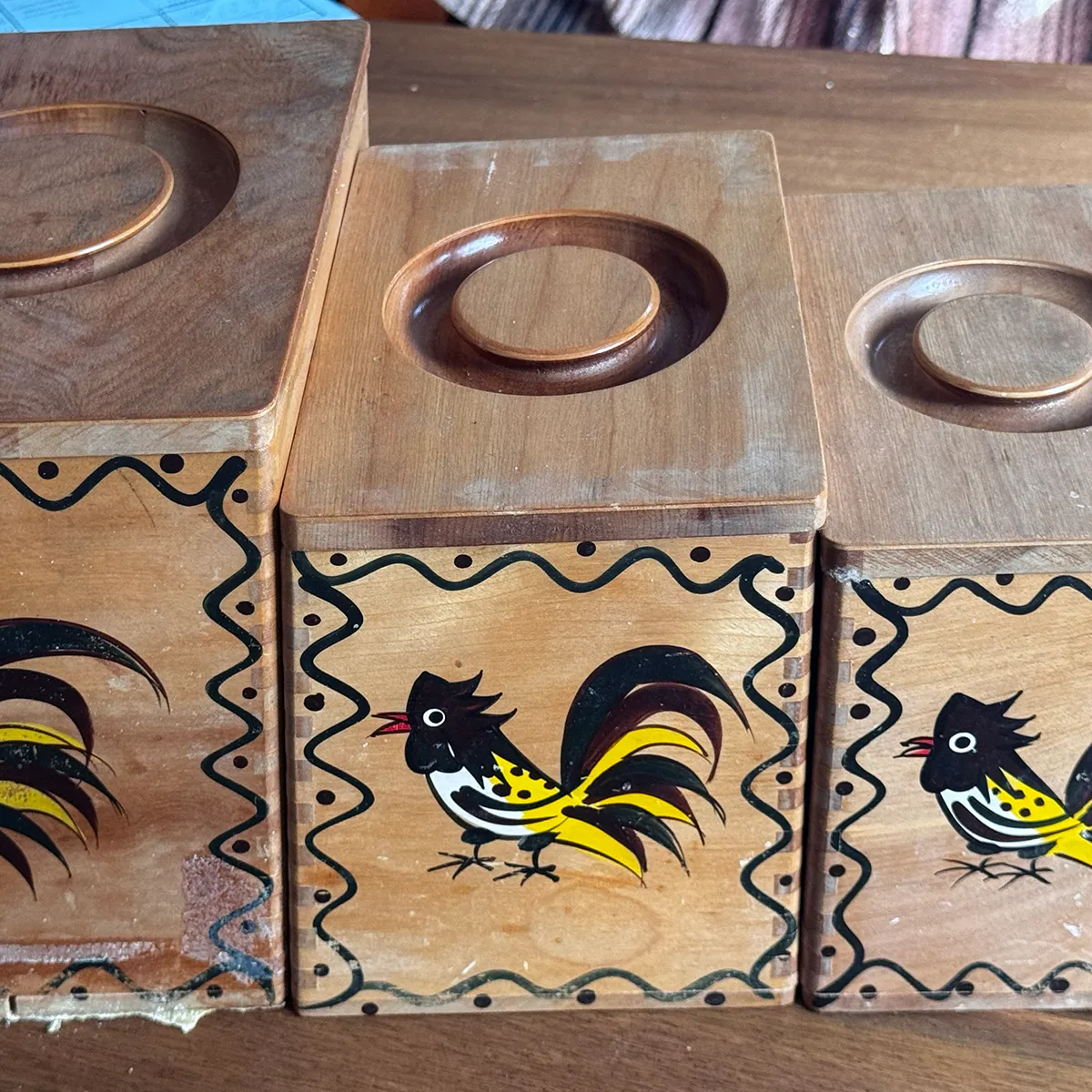 Set of 3 vintage 1950s wooden kitchen canisters with hand-painted rooster designs