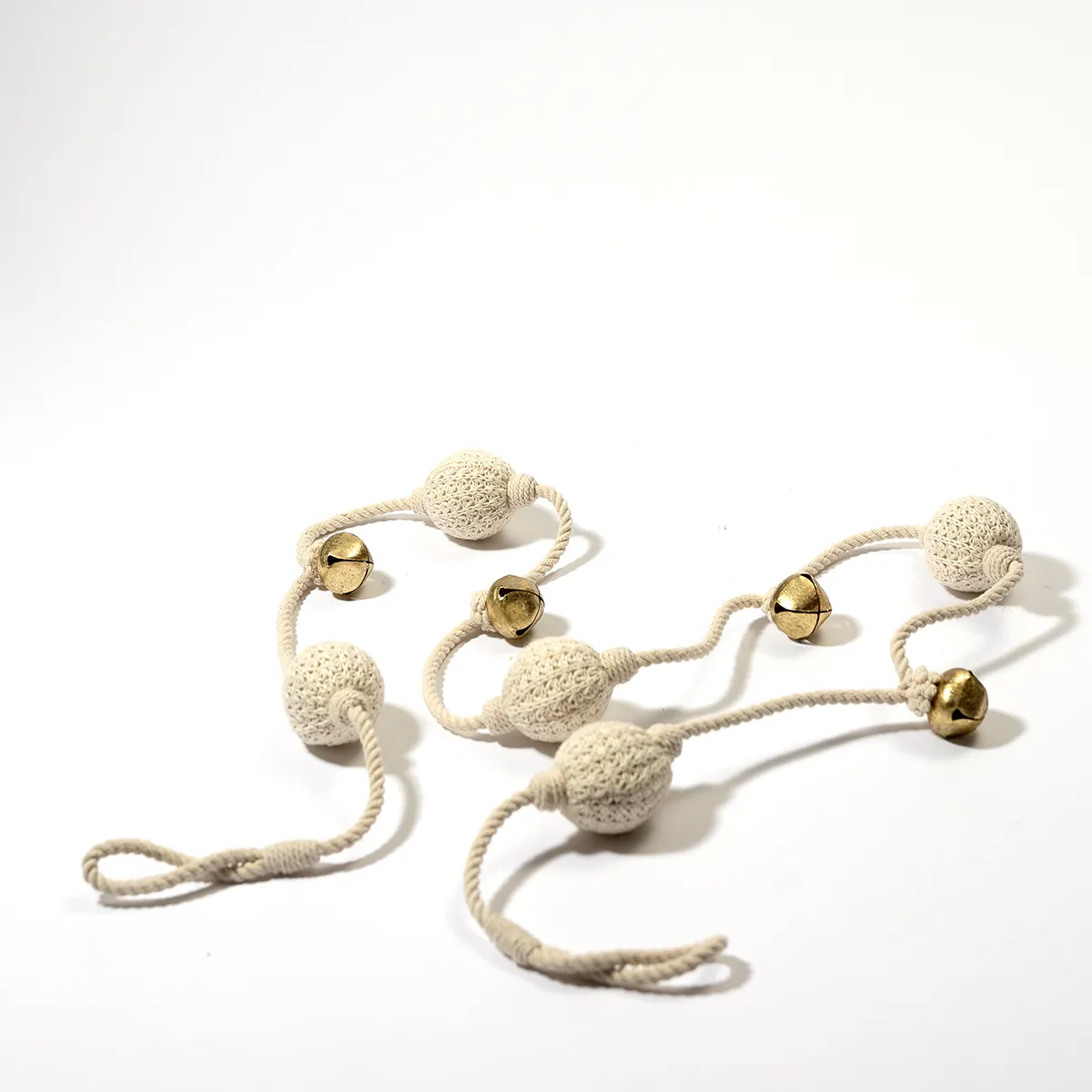 Neutral Bohemian Knit off white balls with gold bells garland 