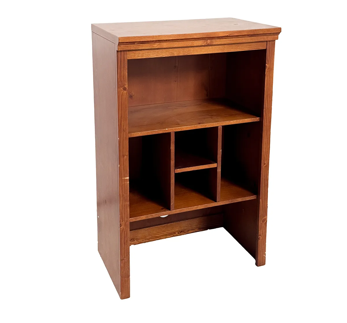 wooden bookcase with a reddish-brown stain. odd uneven openings