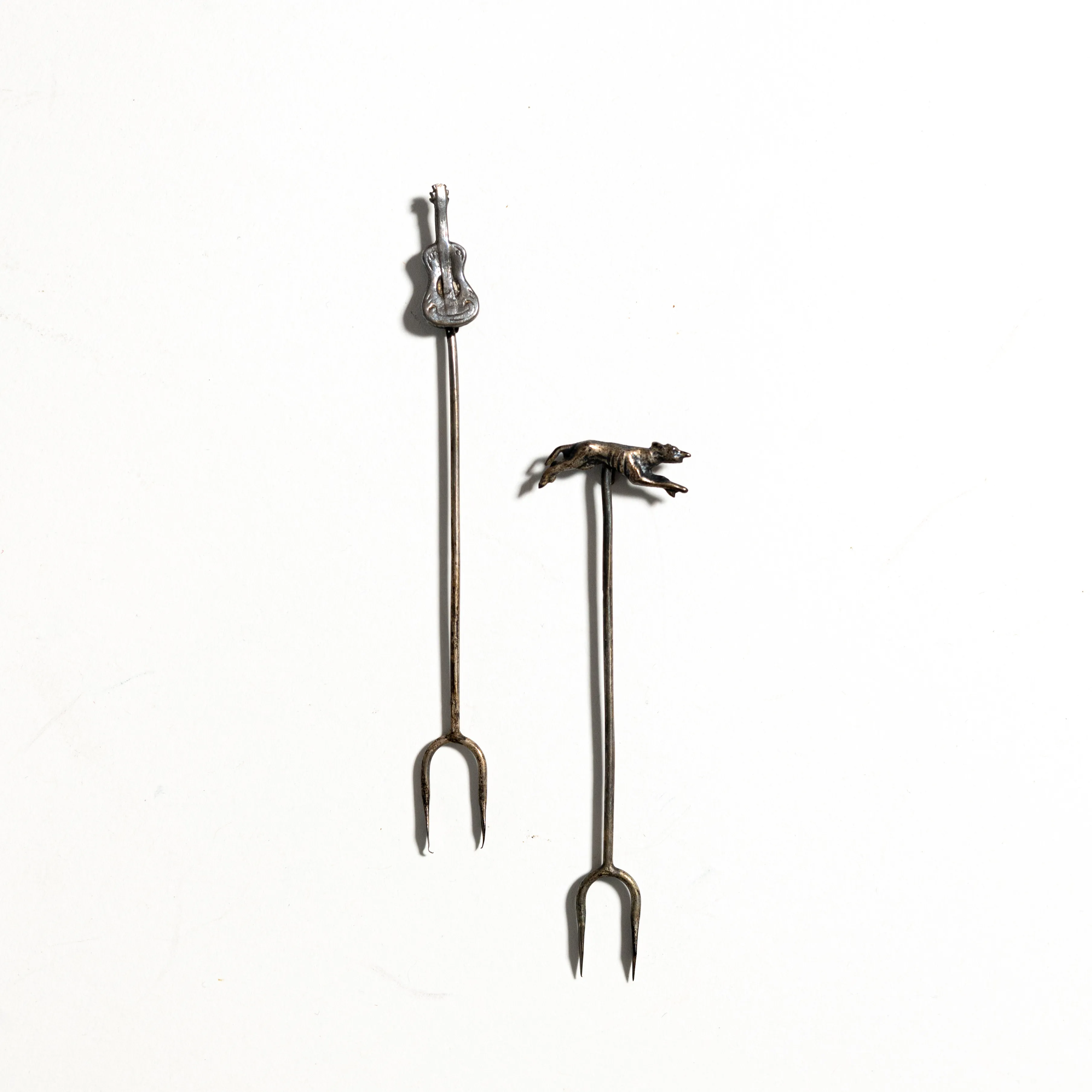 Vintage Silver Olive Fork grey hound and guitar handles