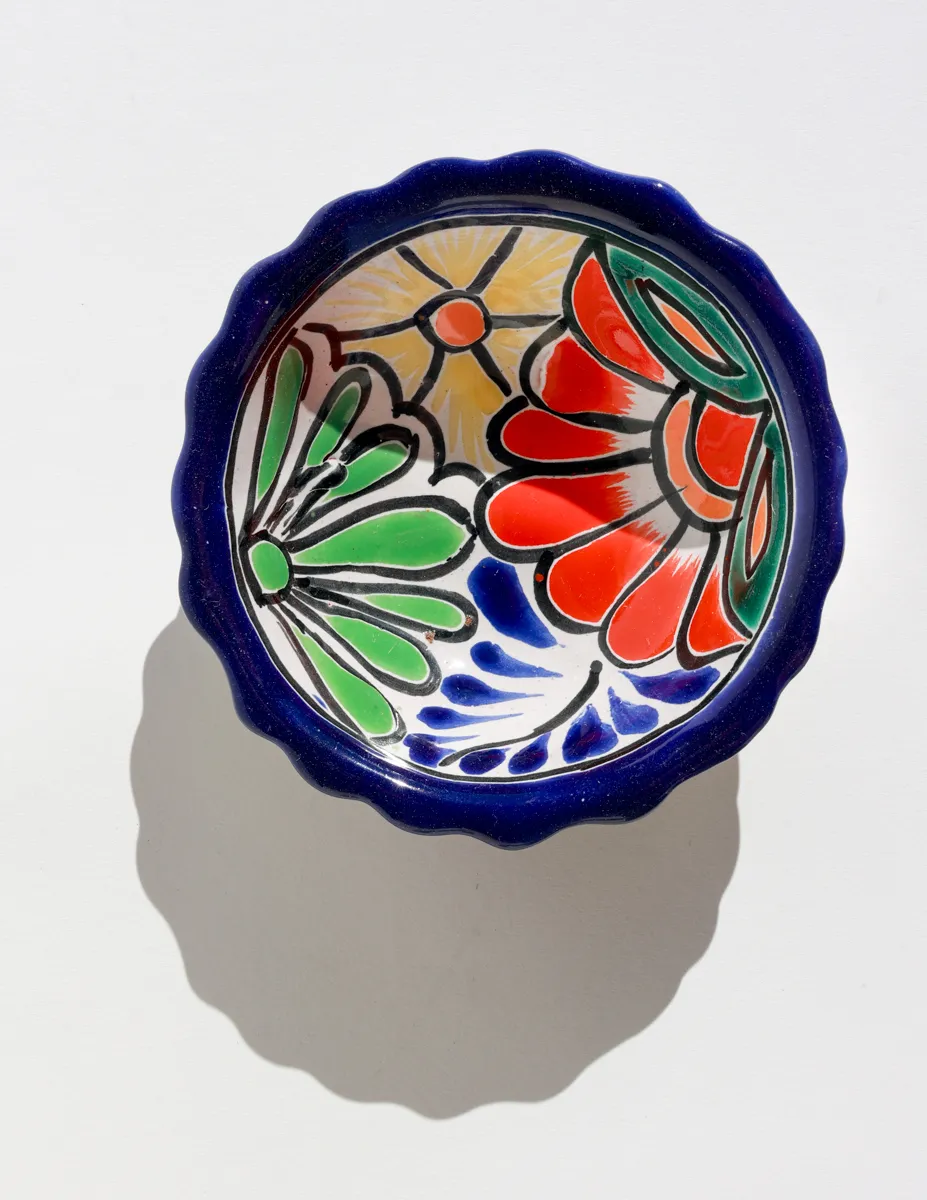 Hand-painted Mexican pottery bowl, typically identified as Talavera ware