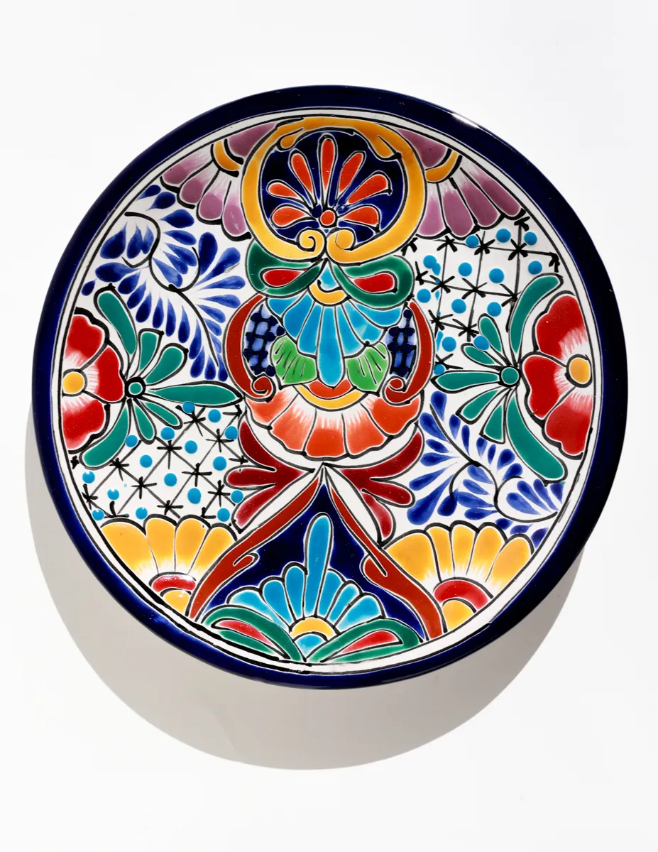 hand-painted Mexican Talavera pottery Dinner plate featuring vibrant floral designs