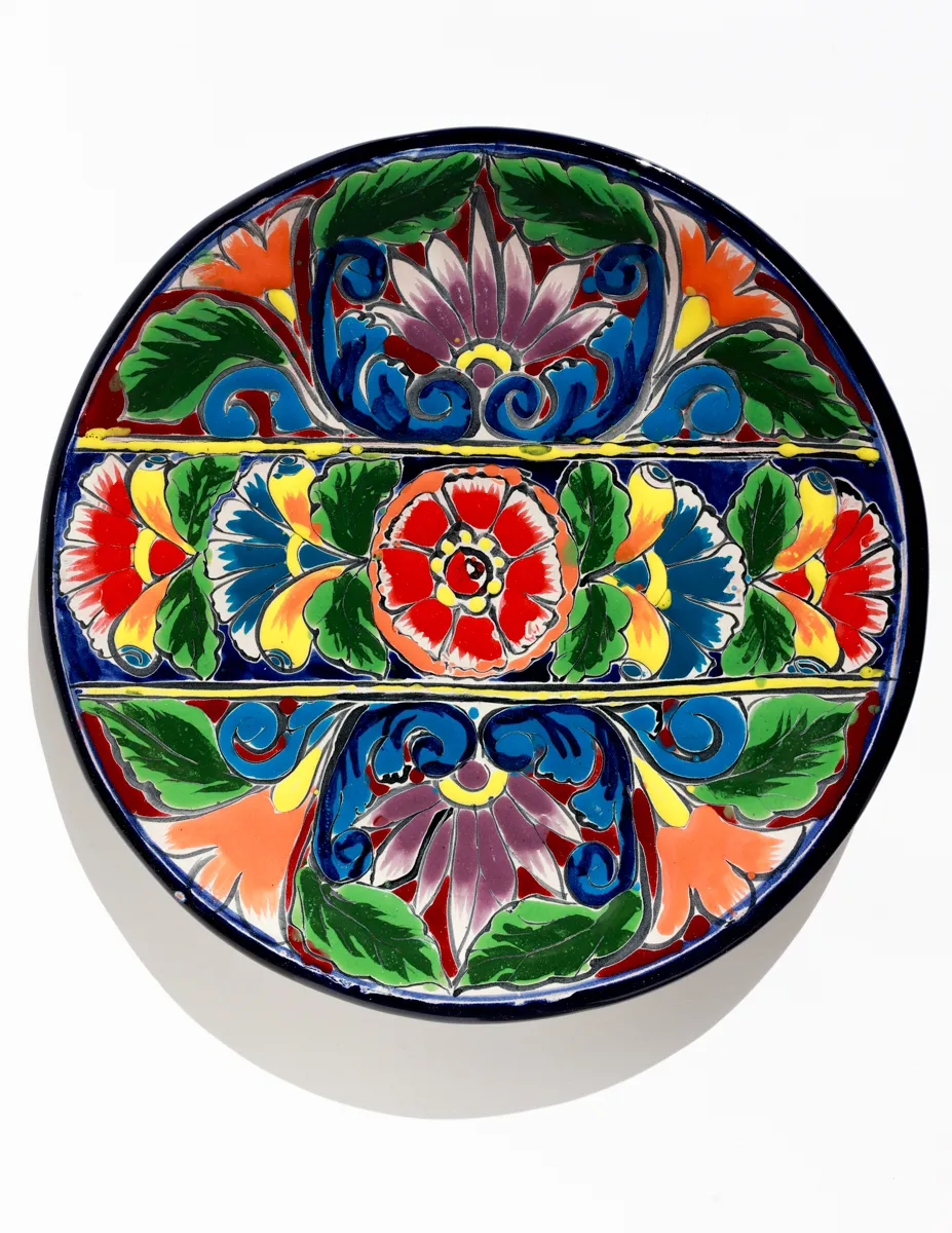 hand-painted Mexican Talavera pottery Dinner plate featuring vibrant floral designs
