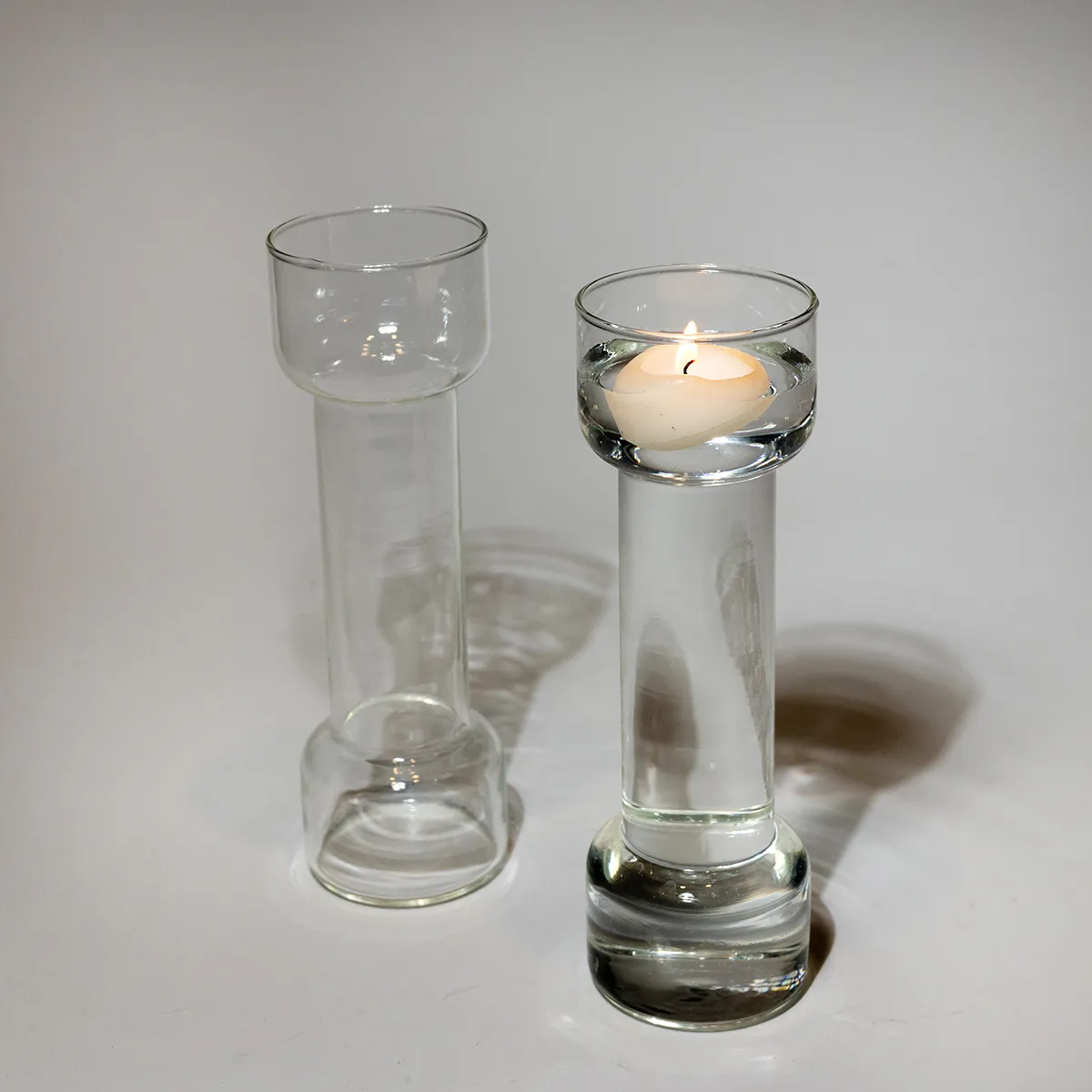 The 1970s uncandle barbell shaped glass vase for floating candle