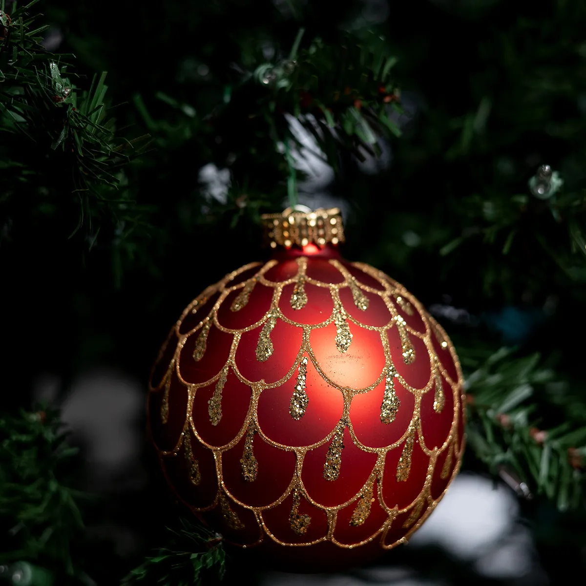 Red and Gold Sphere Christmas Tree Bulb. Gold Glitter looks like Scales