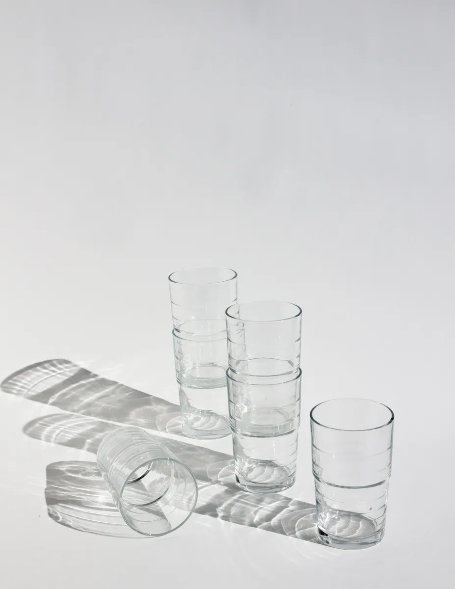 Clear Glass Tumbler Modern style with a distinctive ribbed pattern around the body