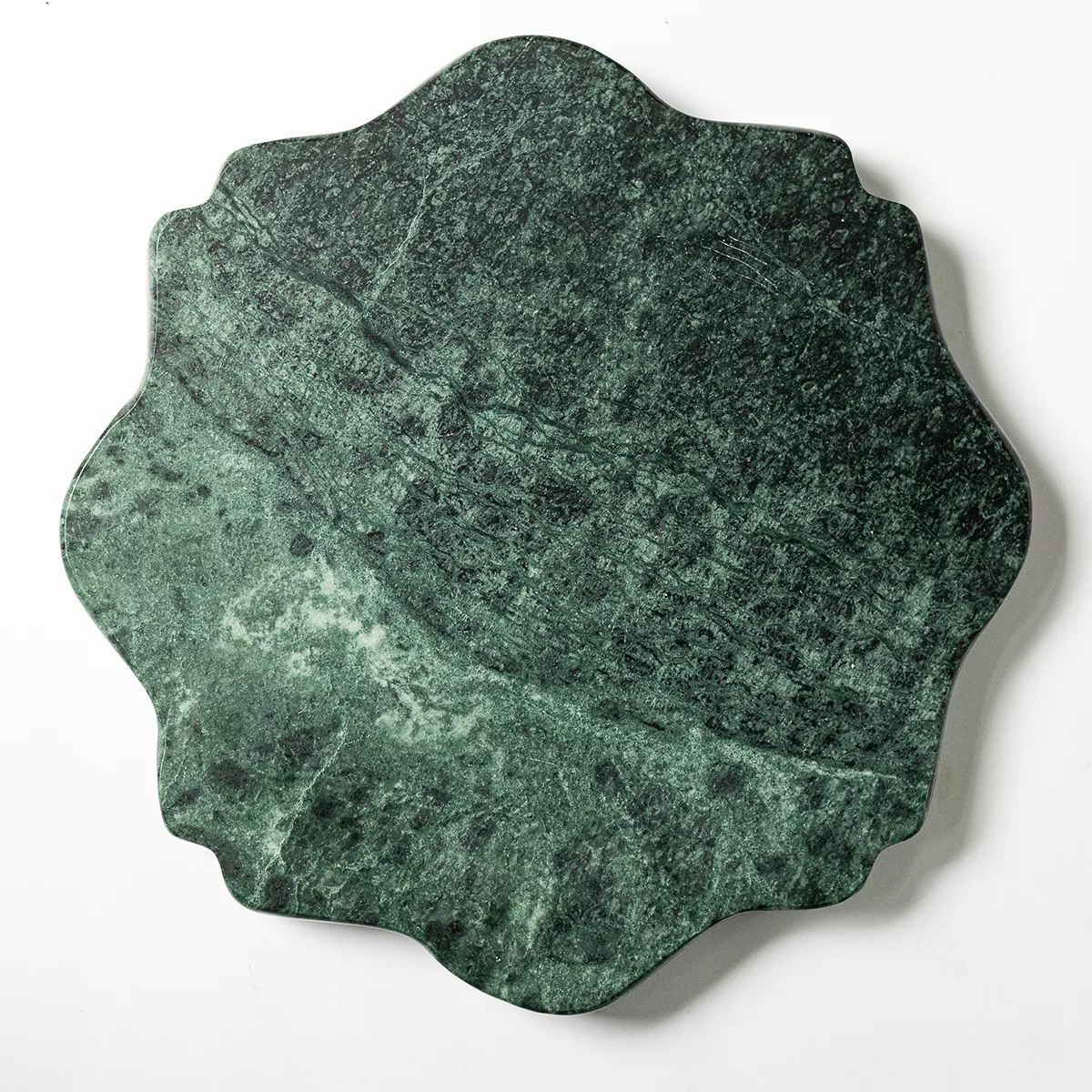 1 inch thick slab of green marble scalloped detail around the edge 