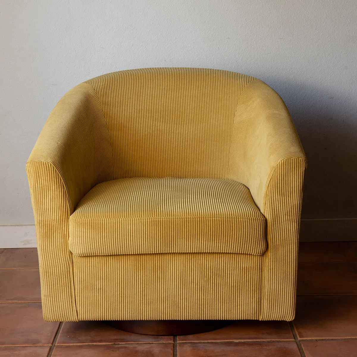 Pale Yellow Corduroy swivel barrel chair 