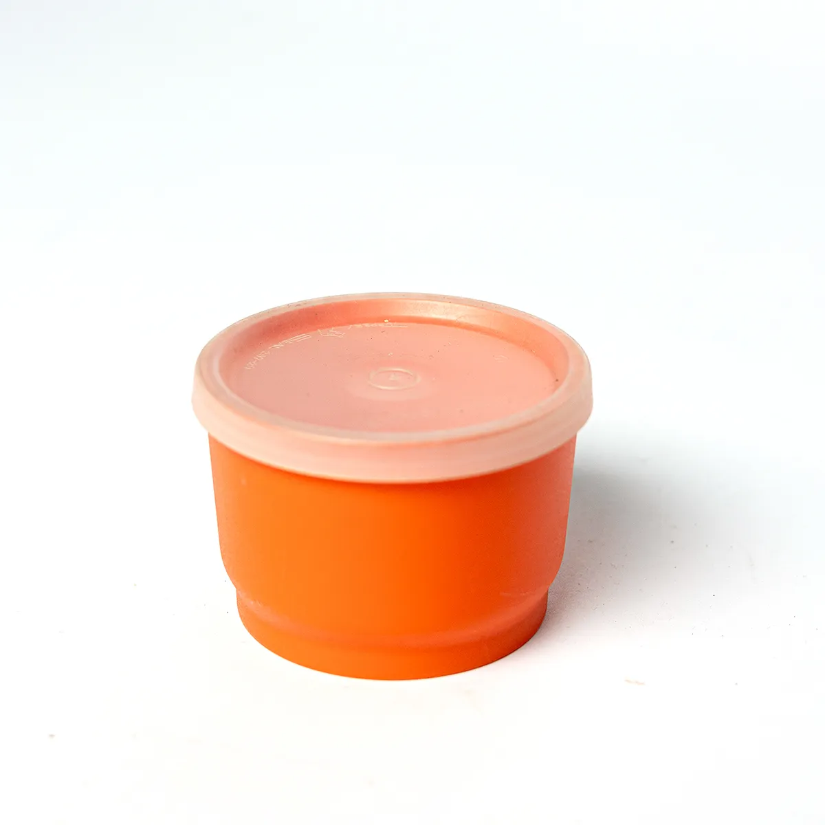 Tupperware: Small Orange Opaque Tupperware Snack Cup with Clear Plastic Lid