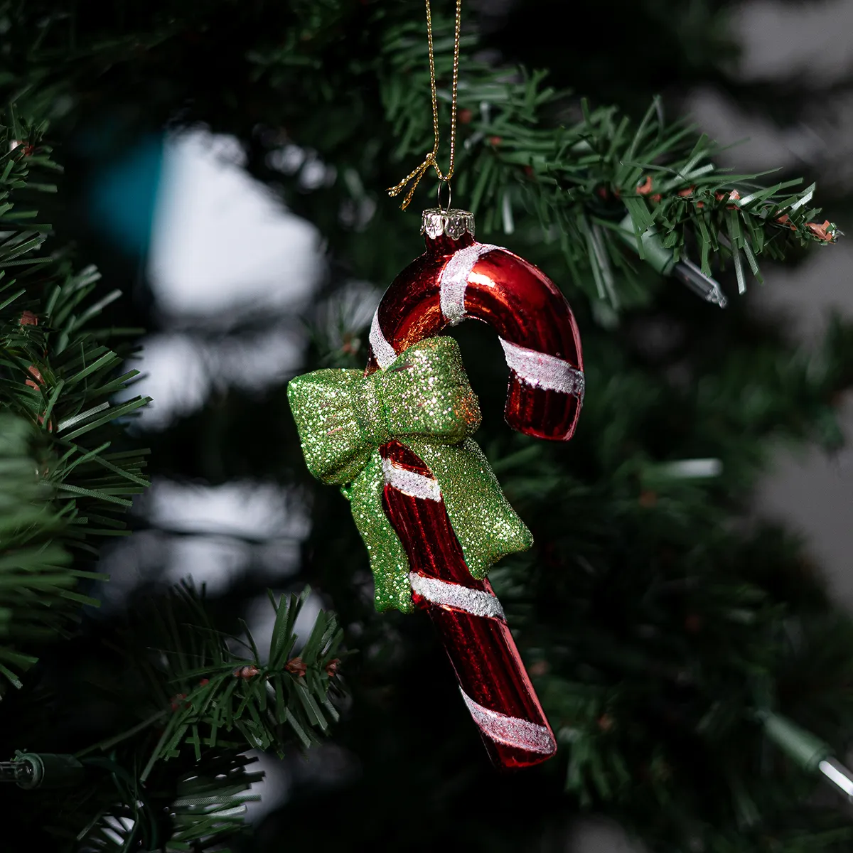 Hand Blown Glass Red and White Candy Cane with a Green Bow. Christmas Tree Ornament