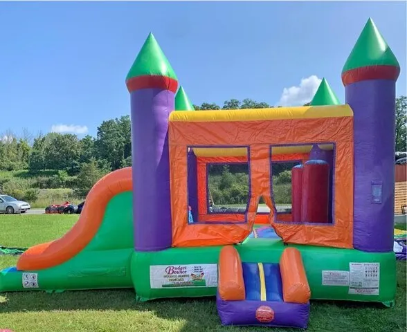 Colorful bounce house and slide delivery for Killington Vermont events - Fortress of Fun