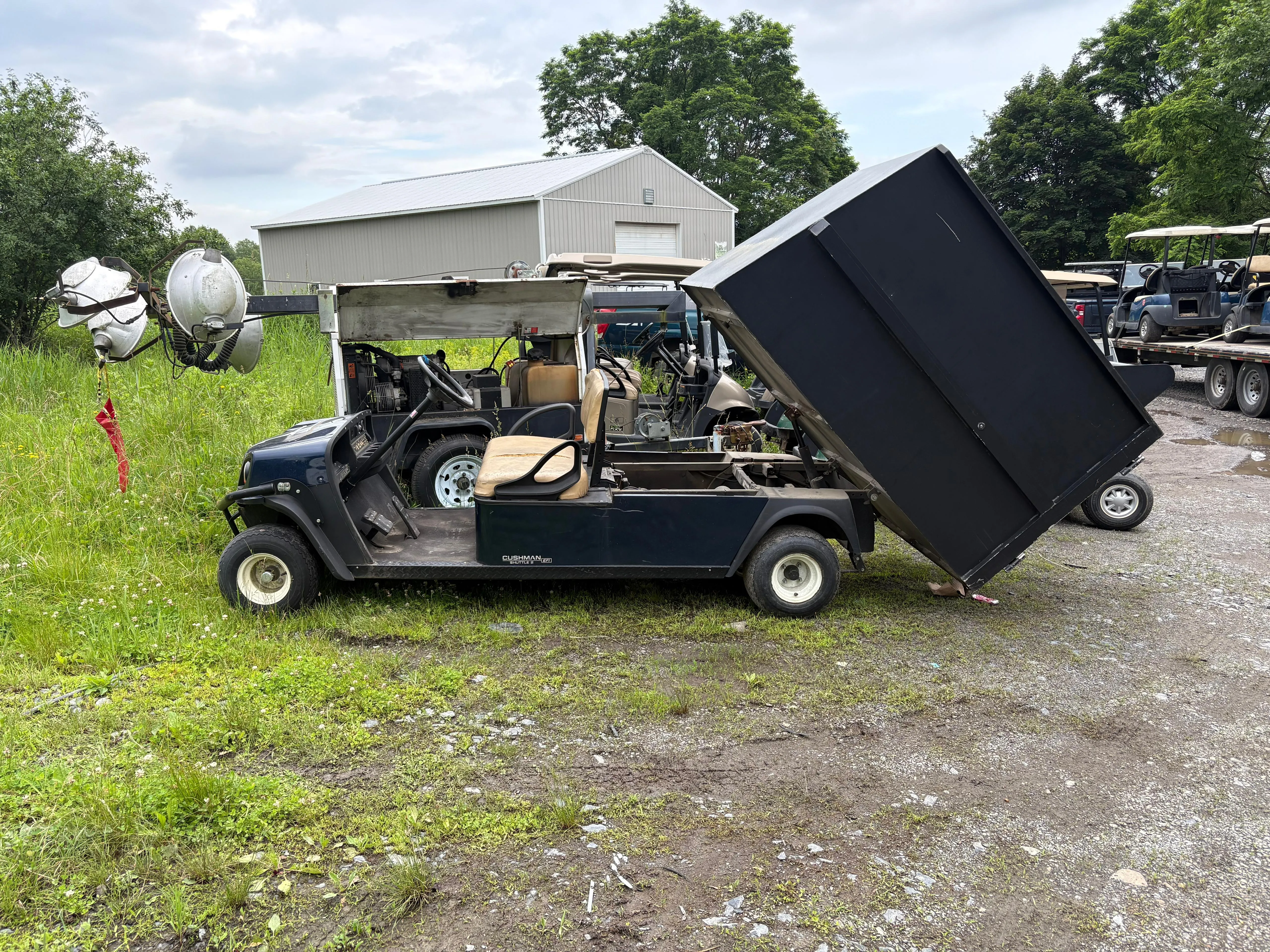 dumpster golf car