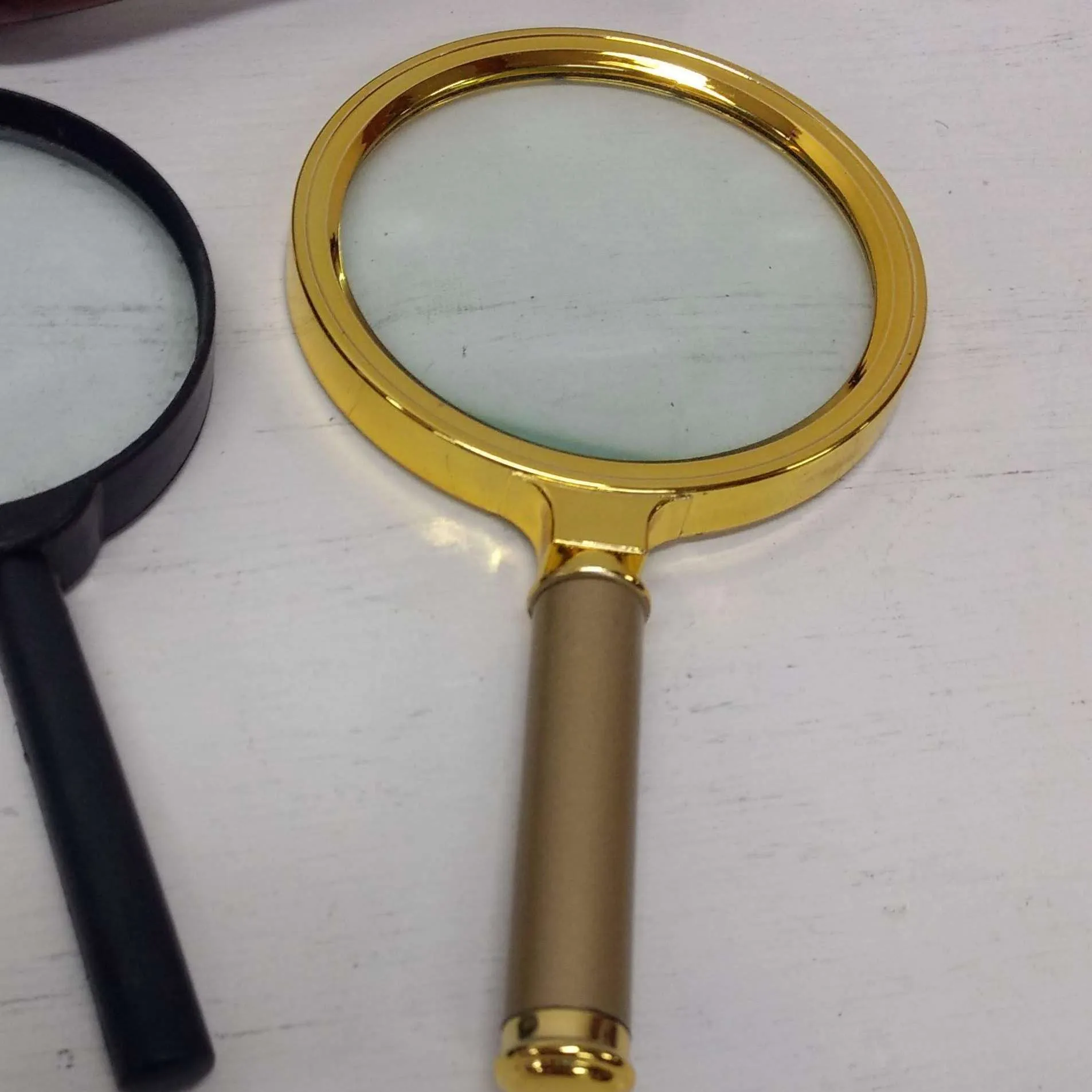 LUPA ESCRITORIO  DE BRONCE Diam. 8 cm  , alt 17 cm