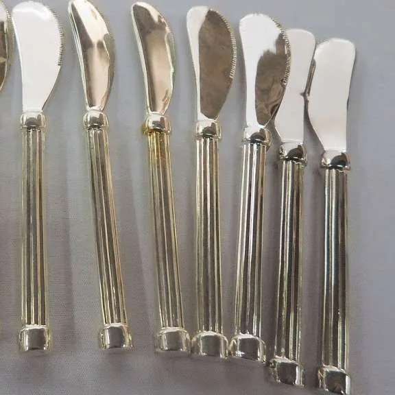 UNTADORES  METAL PLATEADO MANGO ESTRIADO