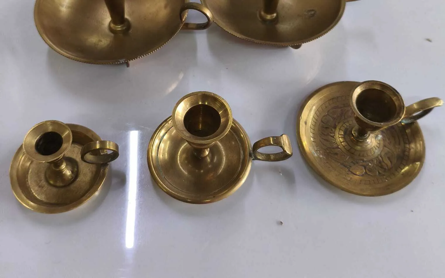 CANDELERO  DE BRONCE CON AZA  DIAM 2 CM Alto 5 cm 