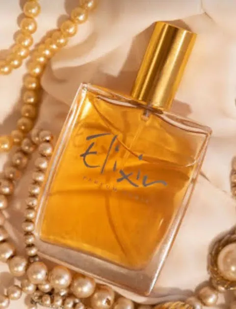 PERFUME ELIXIR COLOR AMBAR CON TAPA DORADA