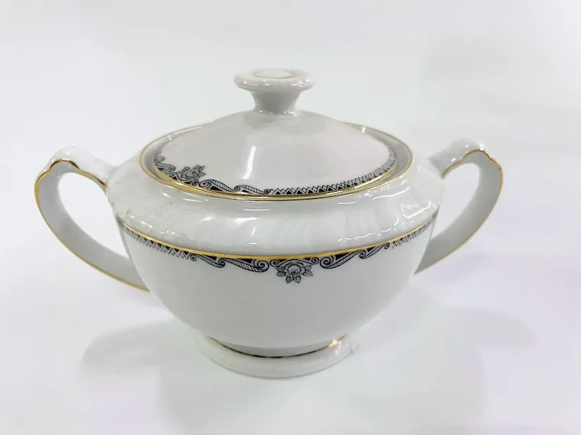 AZUCARERA  BAVARIA GUARDA ORO Y NEGRO  