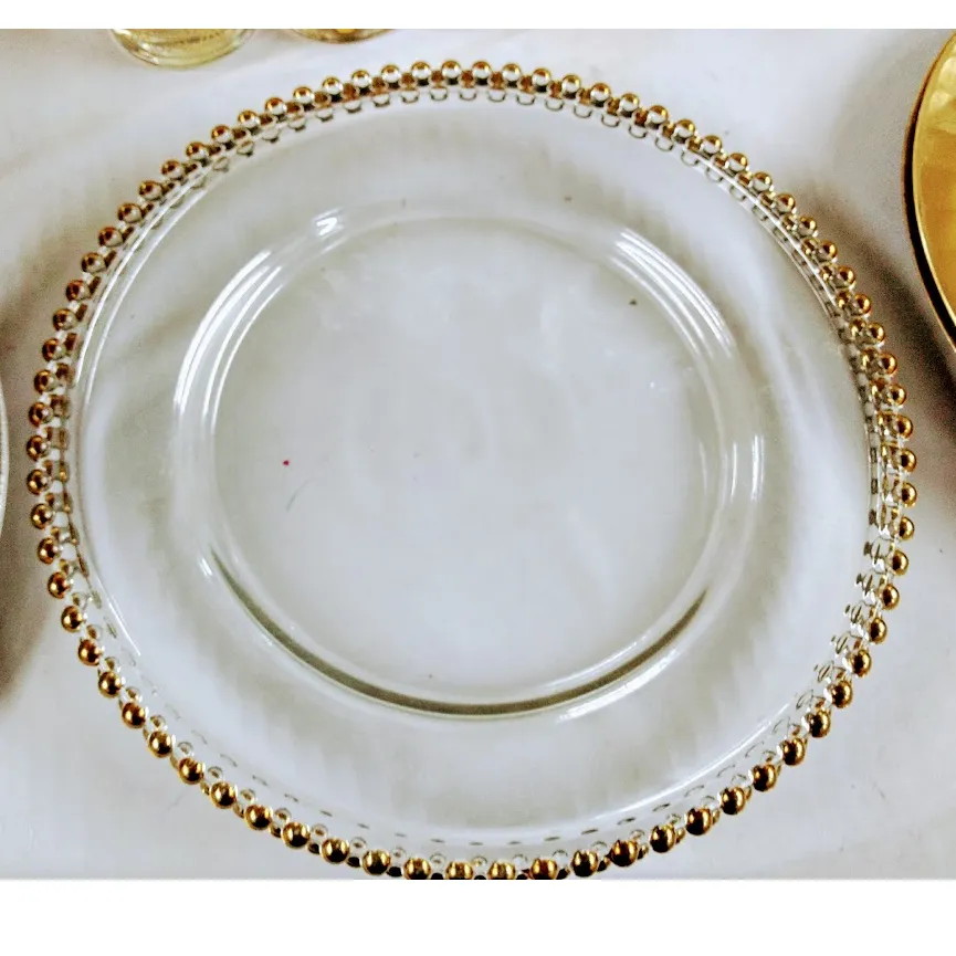 PLATO DE SITIO CRISTAL BORDE PERLA ORO  32 CM