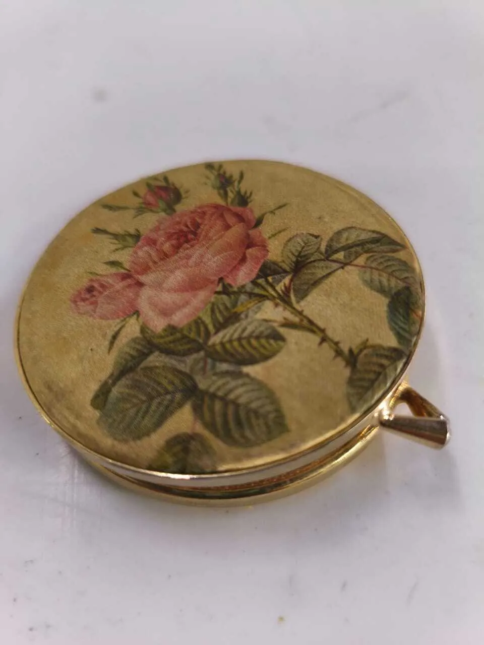 POLVERA  BROCATO Y BRONCE  CON ESTAMPADO DE FLORES ROSA "PBEF"  Diam 6 cm 