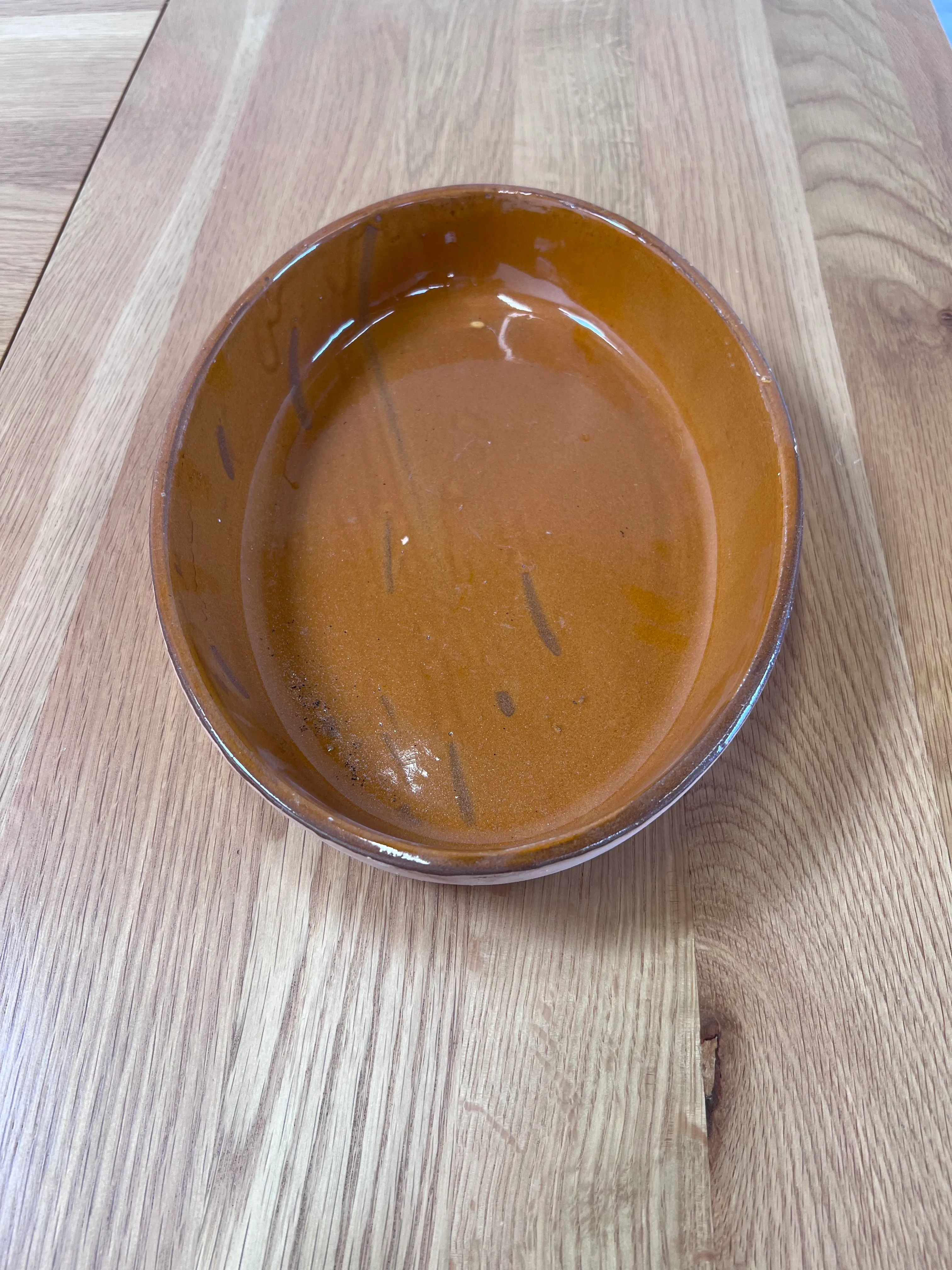 Medium terracotta oval baking dish