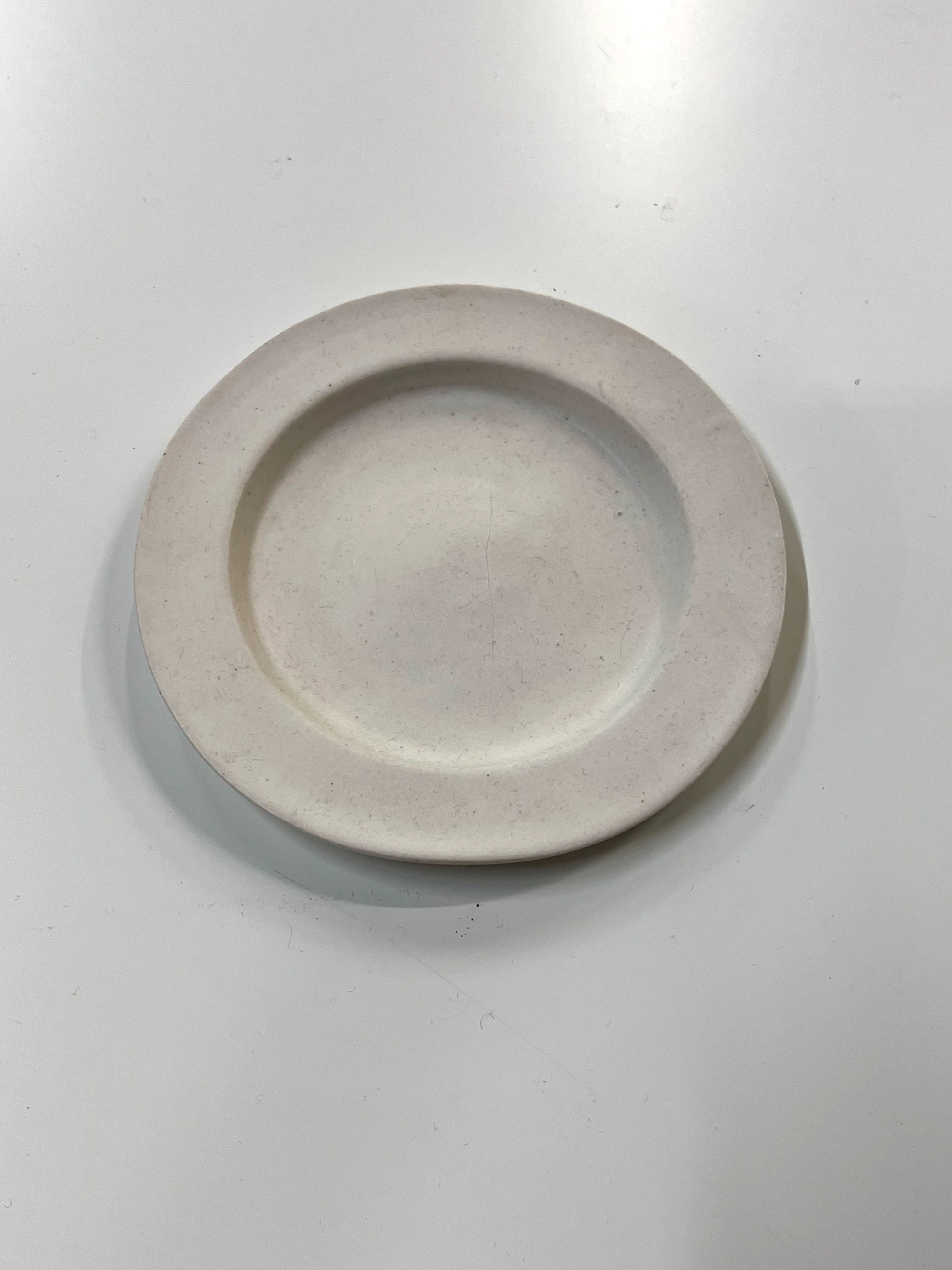 White handmade plate with thick rim