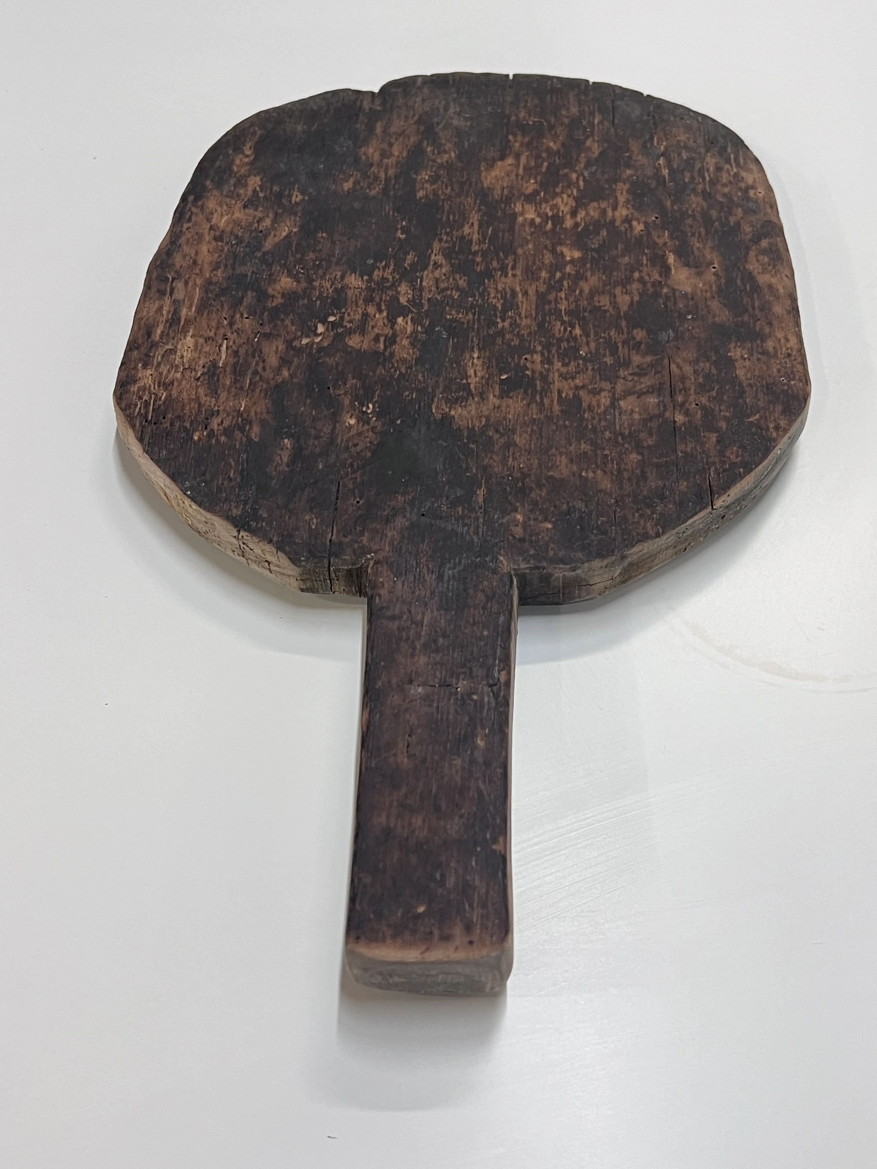 Dark wood hand carved cutting board