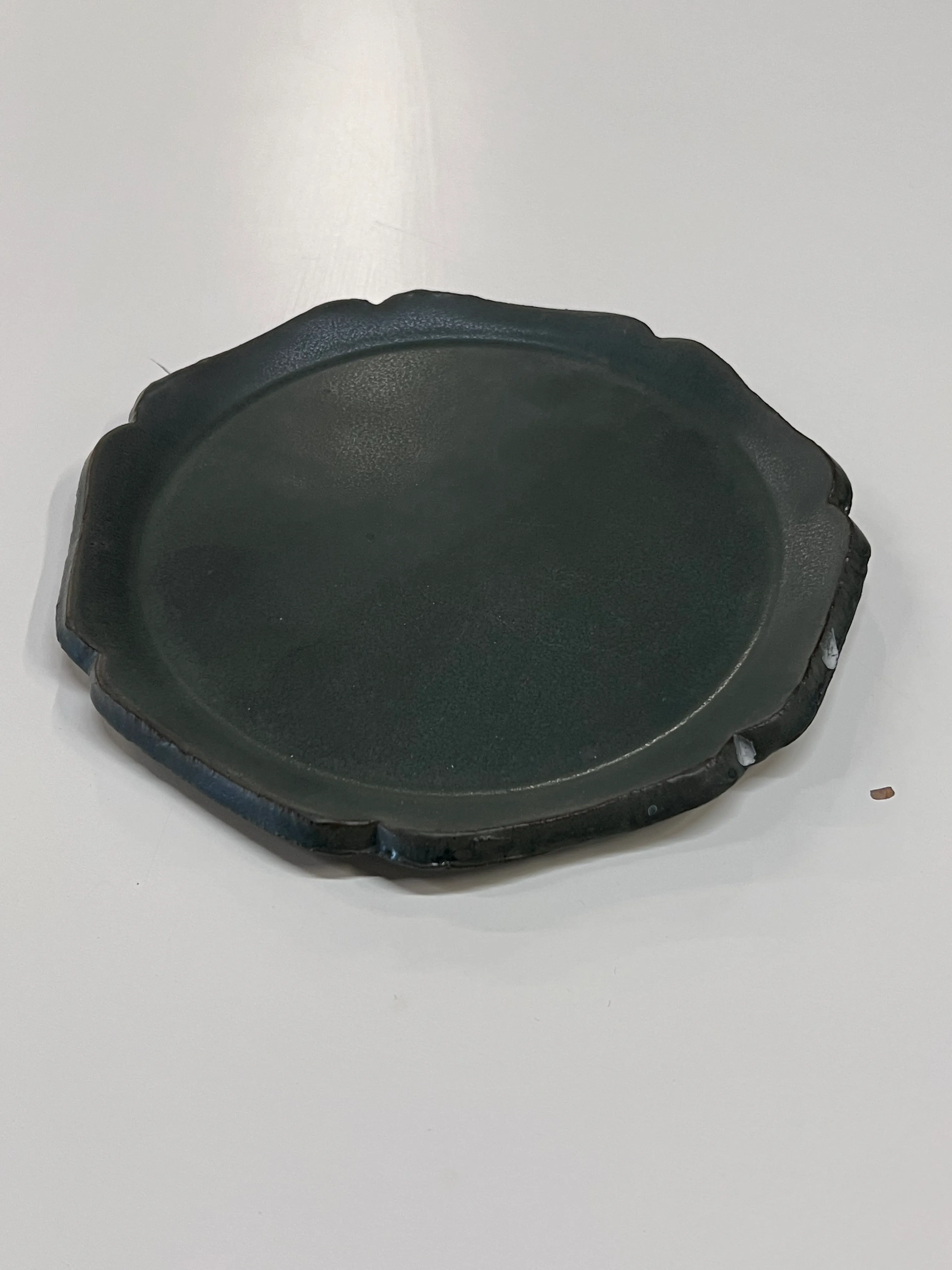 Handmade dark green scalloped app plate