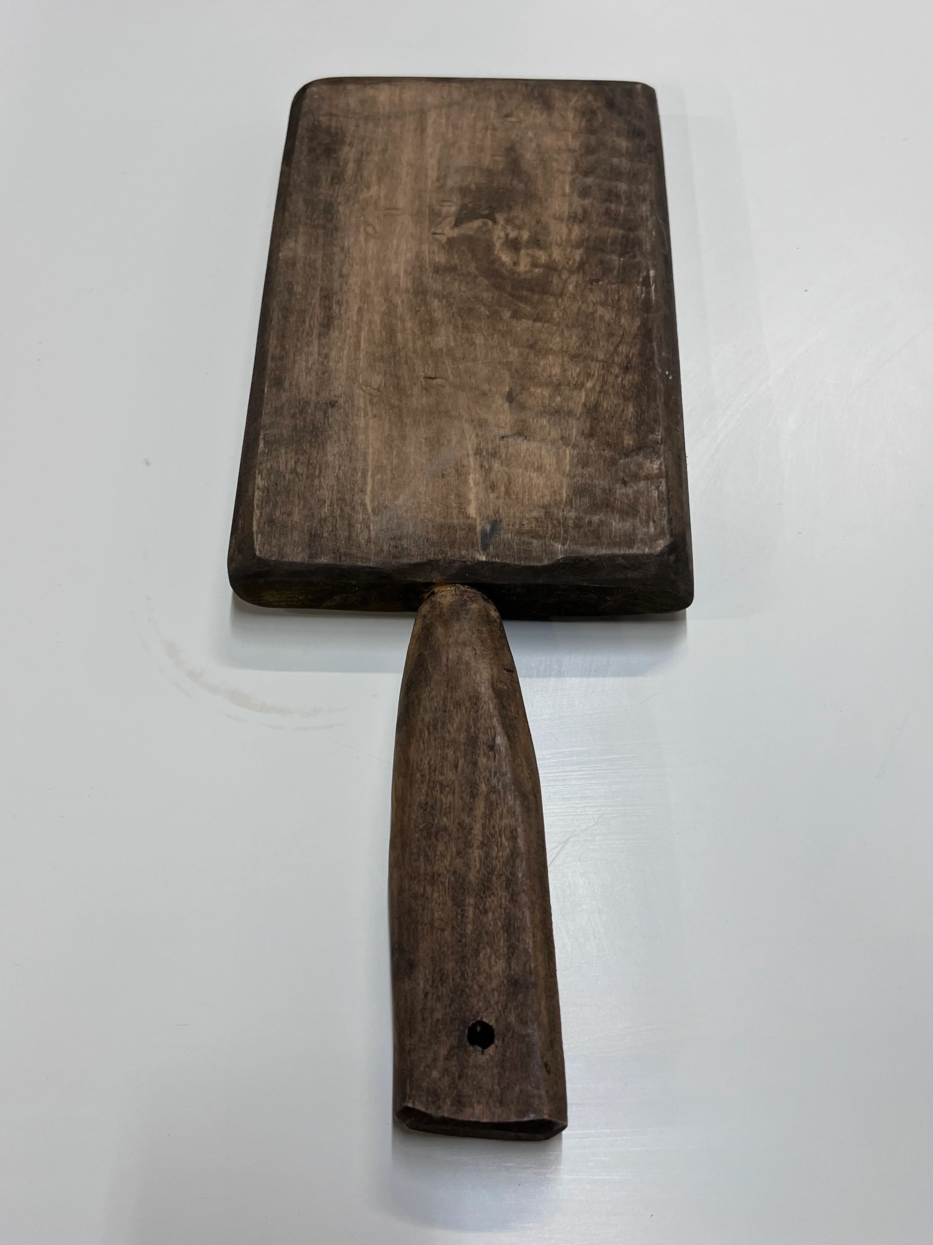 Midtone hand carved cutting board