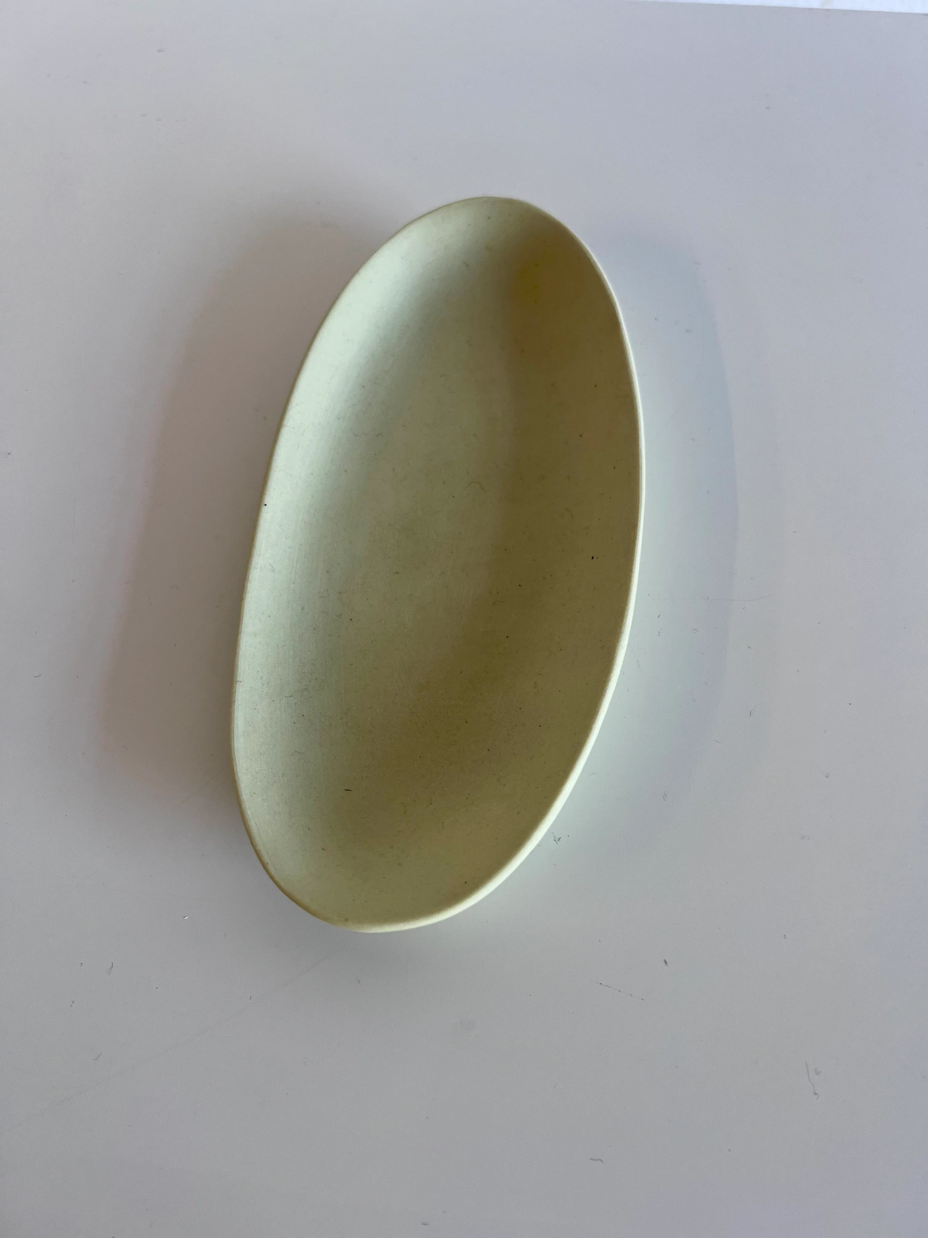Light yellow oval small platter