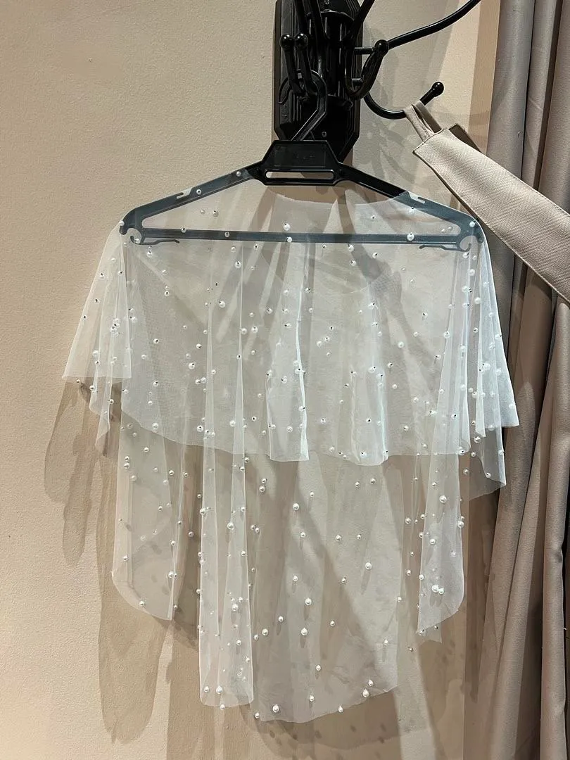 S05AAT 1260 Short long pearl bolero