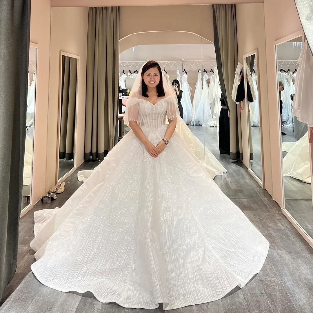 S05AAT 1170 Straight pearls off shoulder ball gown