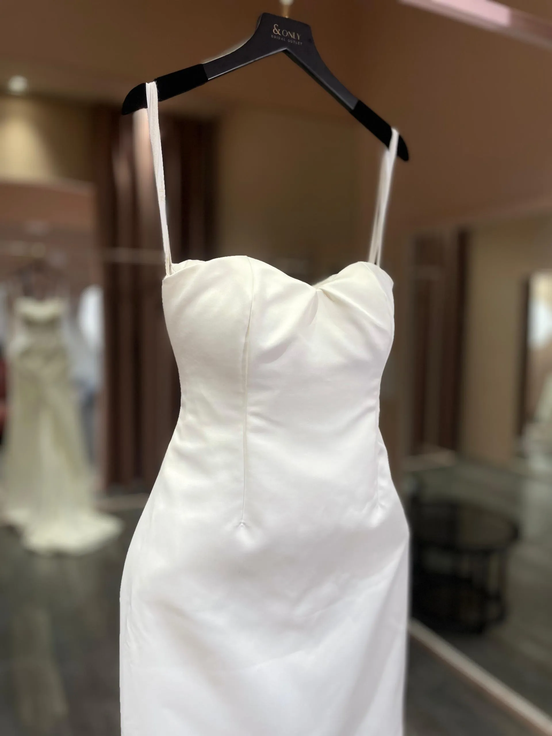 1764 - A sleek, minimalist white dress