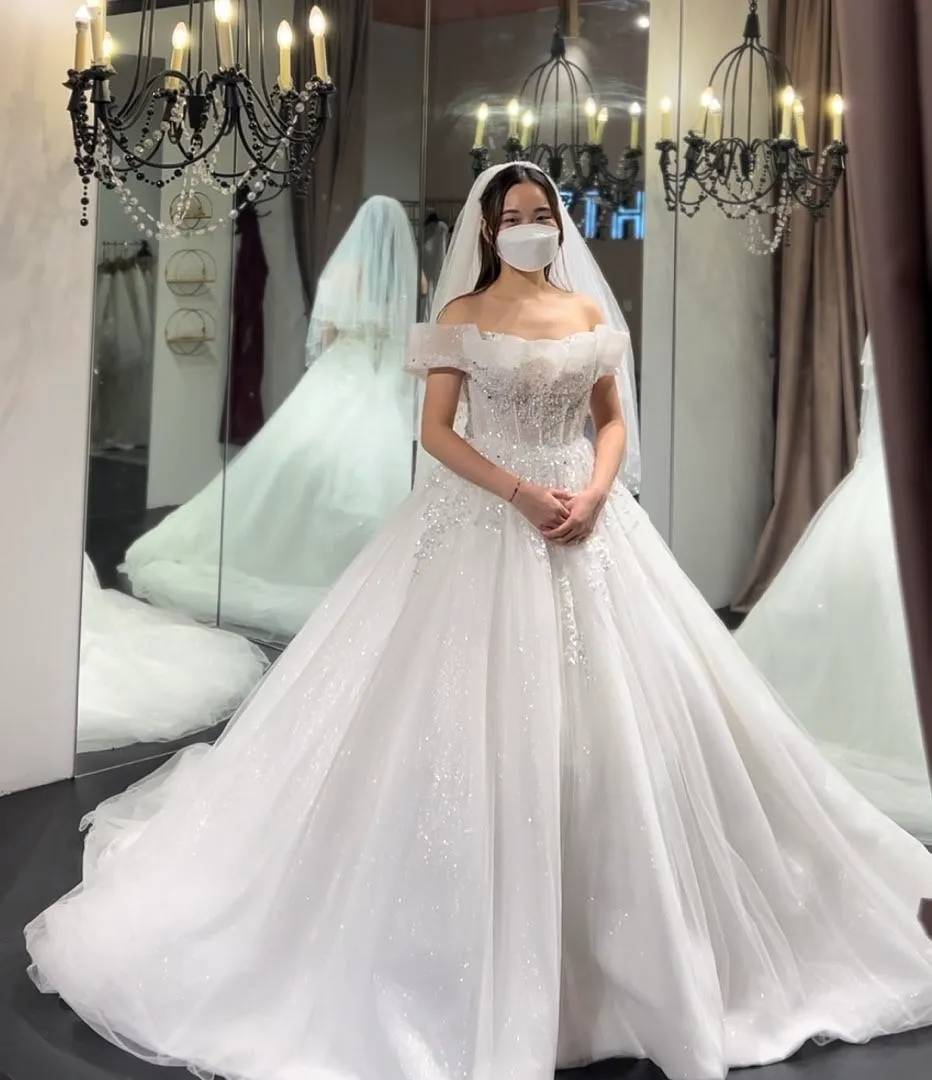 S05AAT 0966 - Ruffled off shoulder glitter ball gown