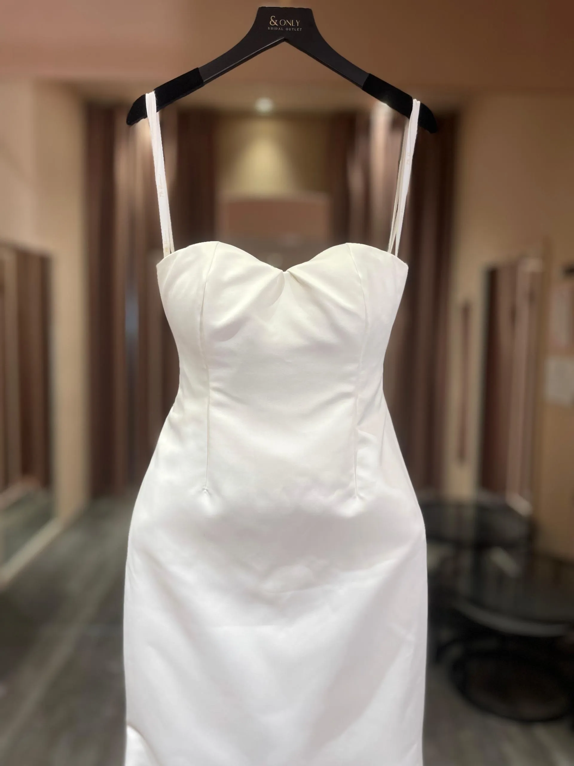 1764 - A sleek, minimalist white dress