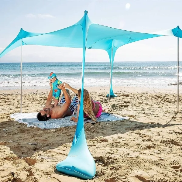 SUN NINJA Pop Up Beach Tent Sun Shelter UPF50+ with Sand Shovel, Ground Pegs and Stability Poles, 7x7 FT 4 Pole Turquoise