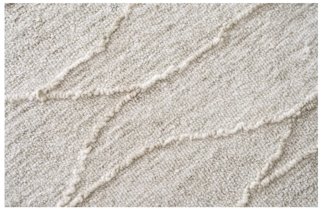 Tan Rug with Weaving