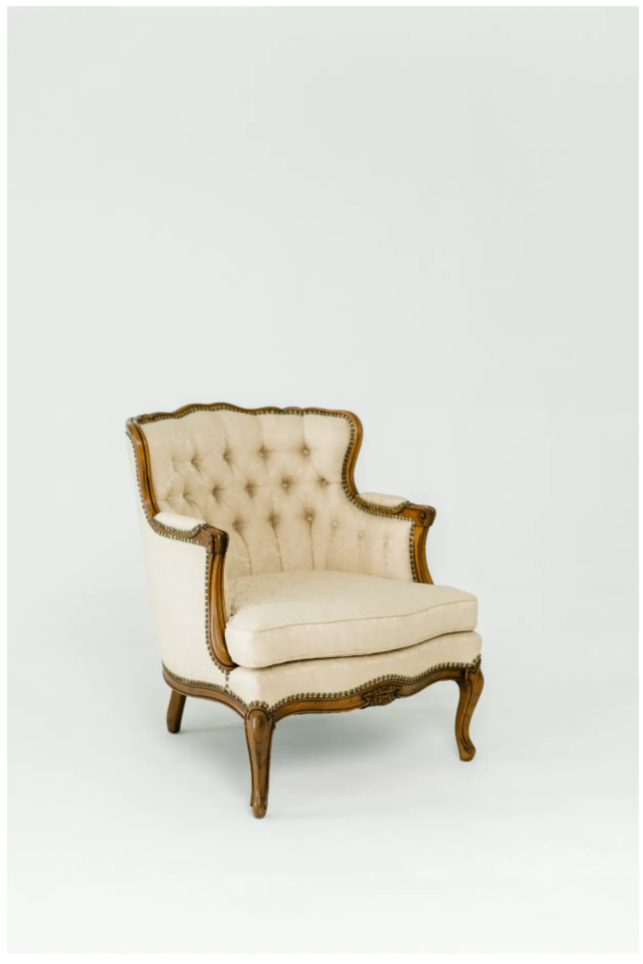 Chair with Tan Fabric & Intricute Wood Detailing