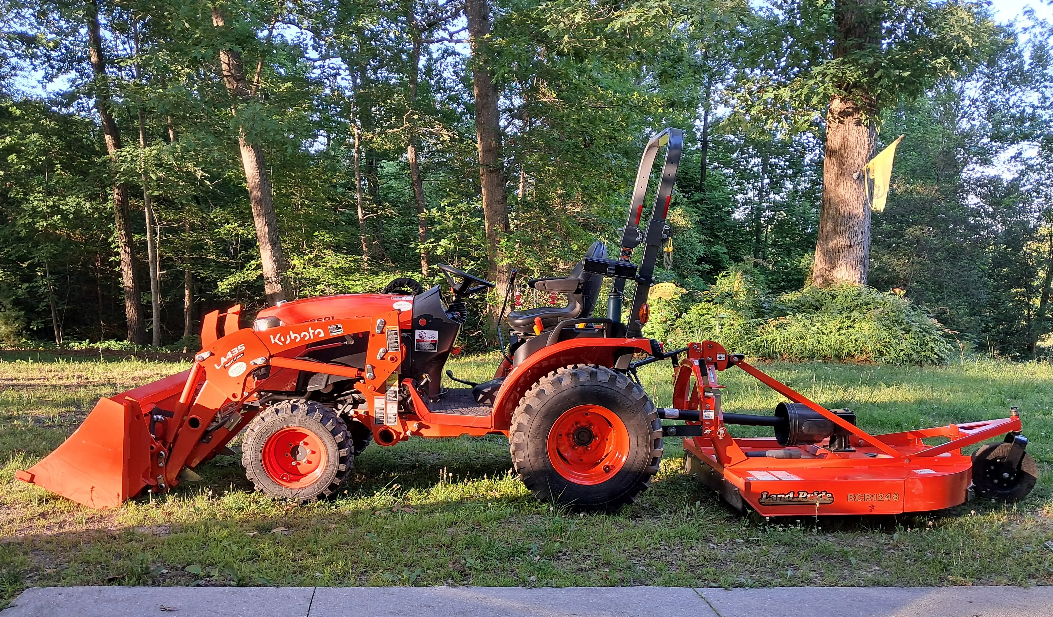 Kubota B2601 with Combo Bucket and Rotary Cutter
