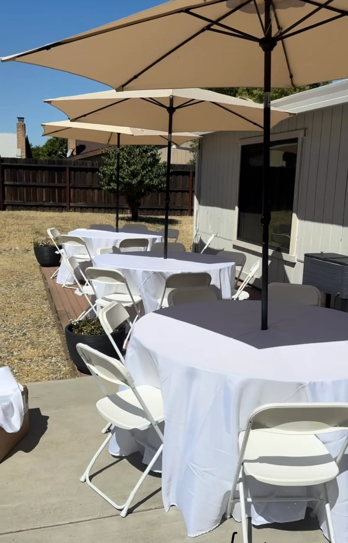 60-Inch Round Wooden Table with 9ft Taupe Umbrella & Tablecloth – Outdoor Event Rental