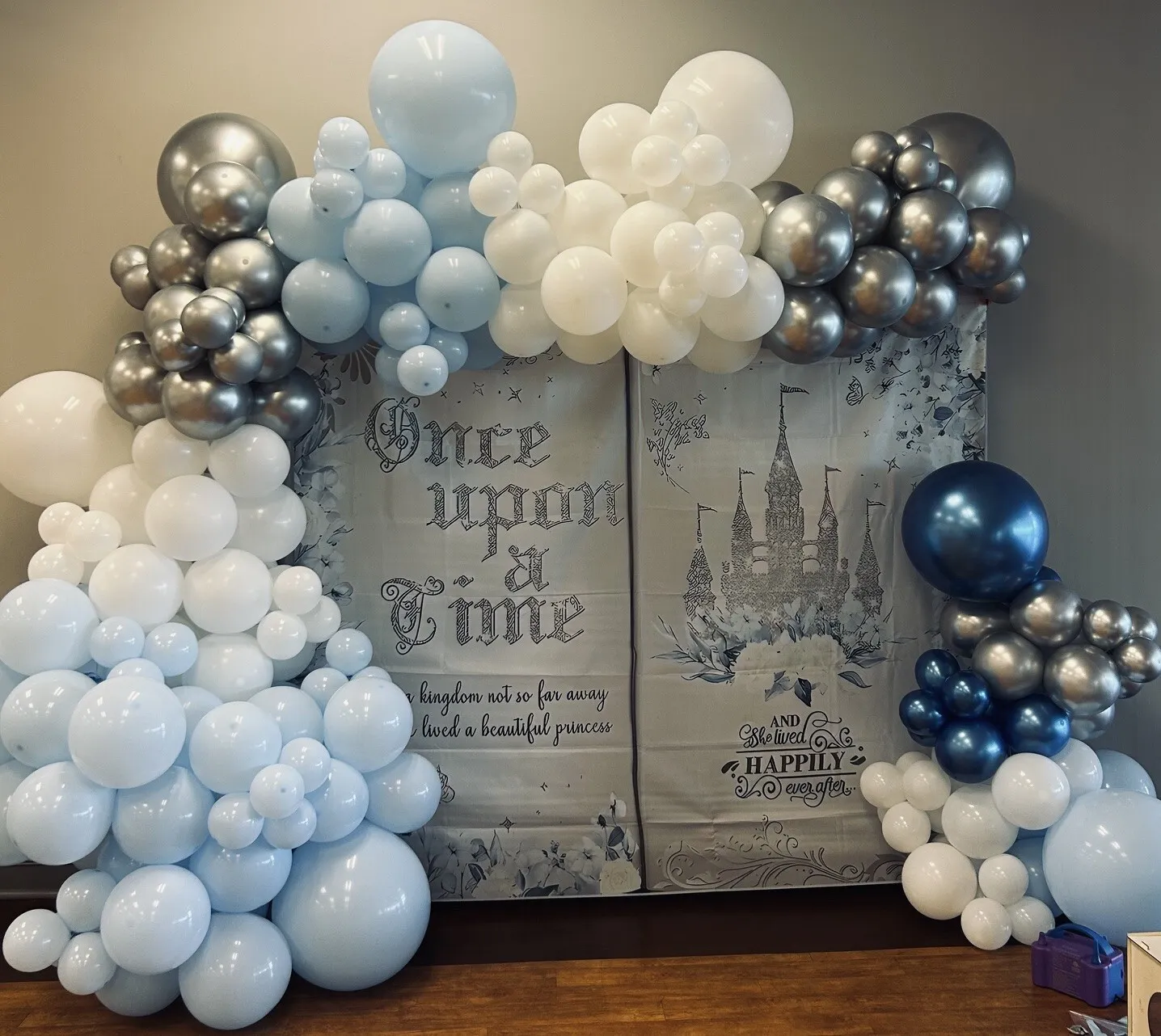 Cinderella-themed Quinceañera balloon decor with custom balloon garland in Kansas City Missouri