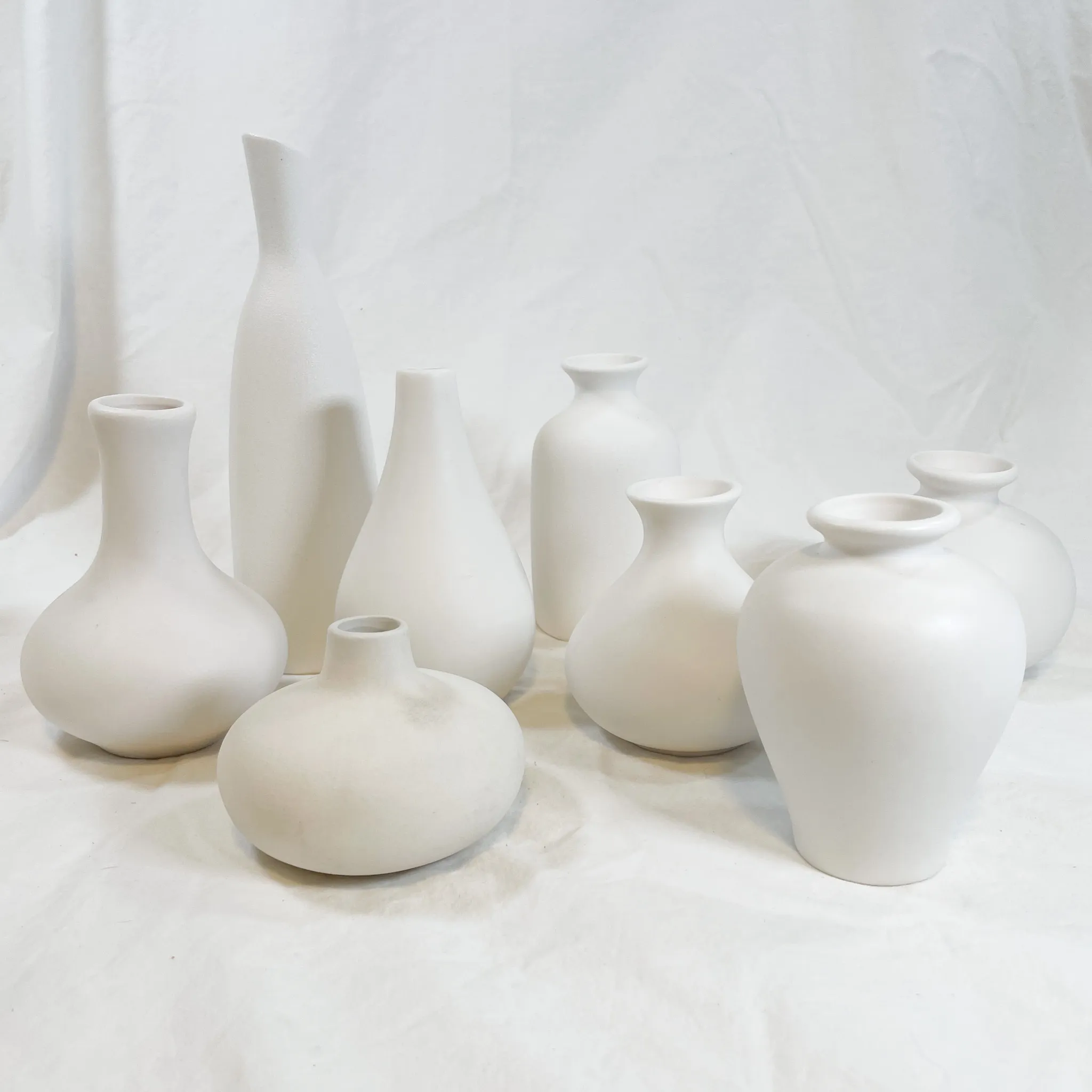Assorted White Bud Vases