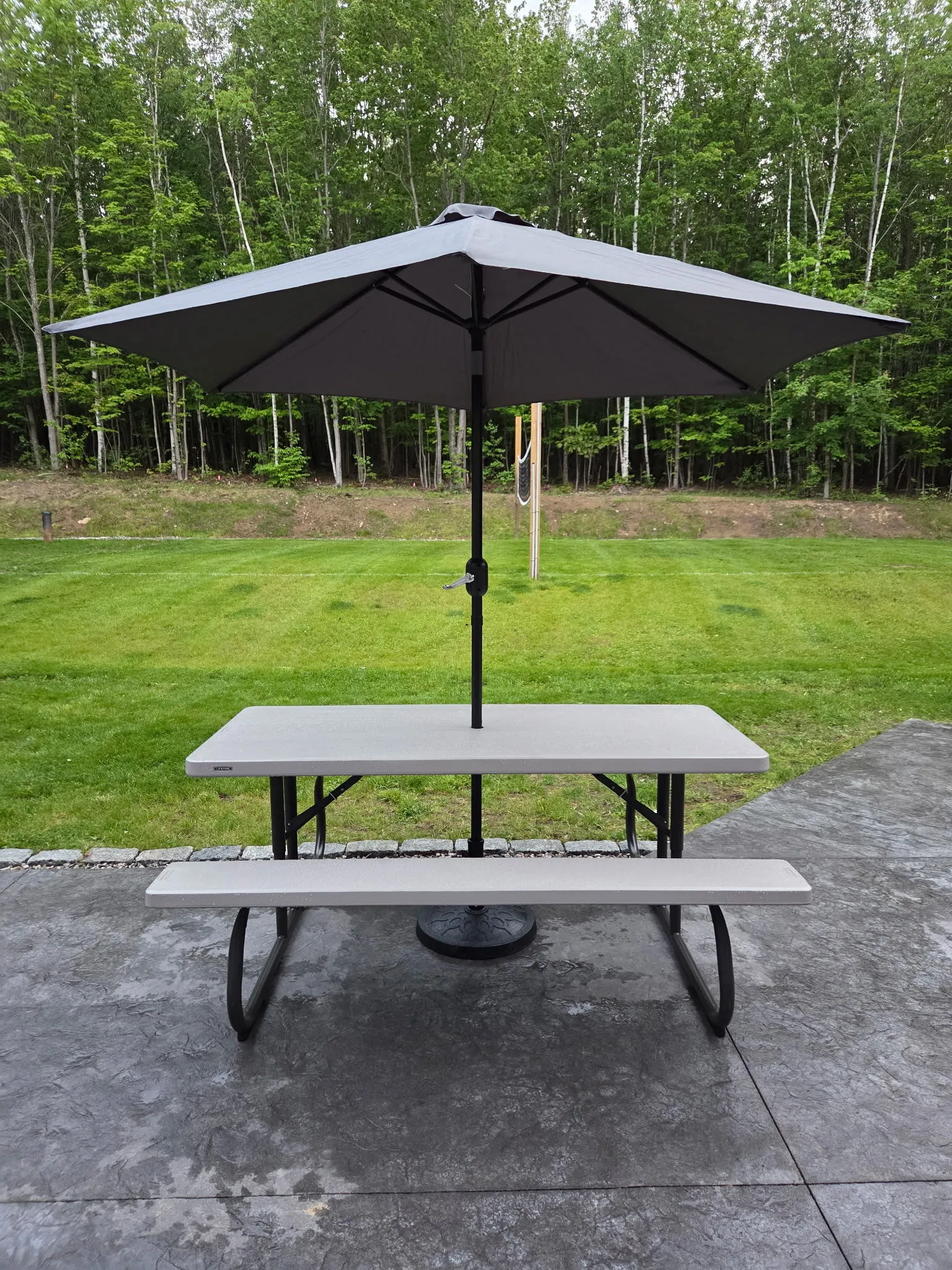 Picnic table with umbrella