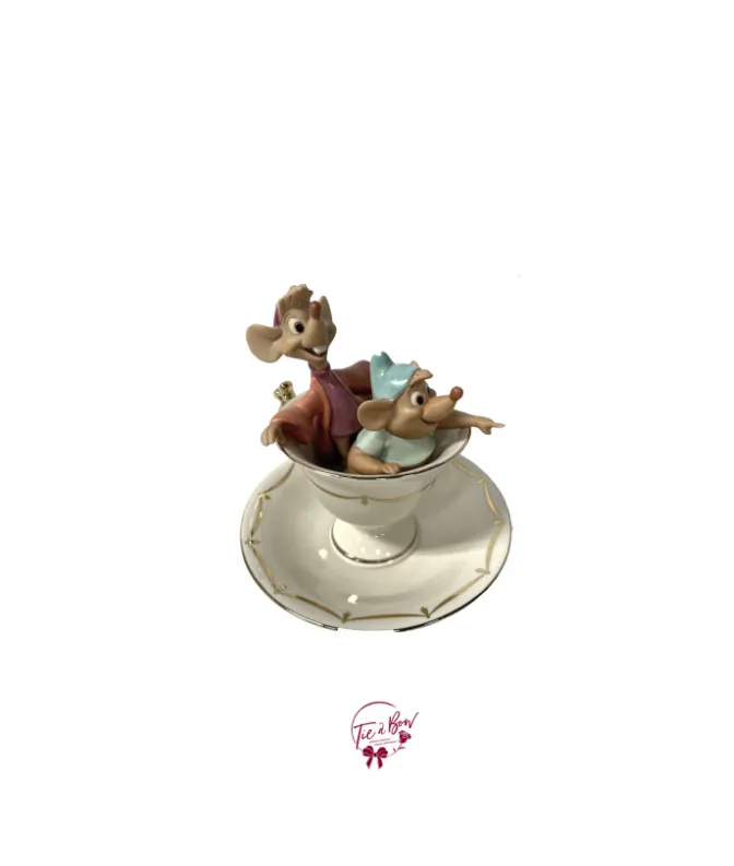 Mice Jaq and Gus in a gold tea cup
