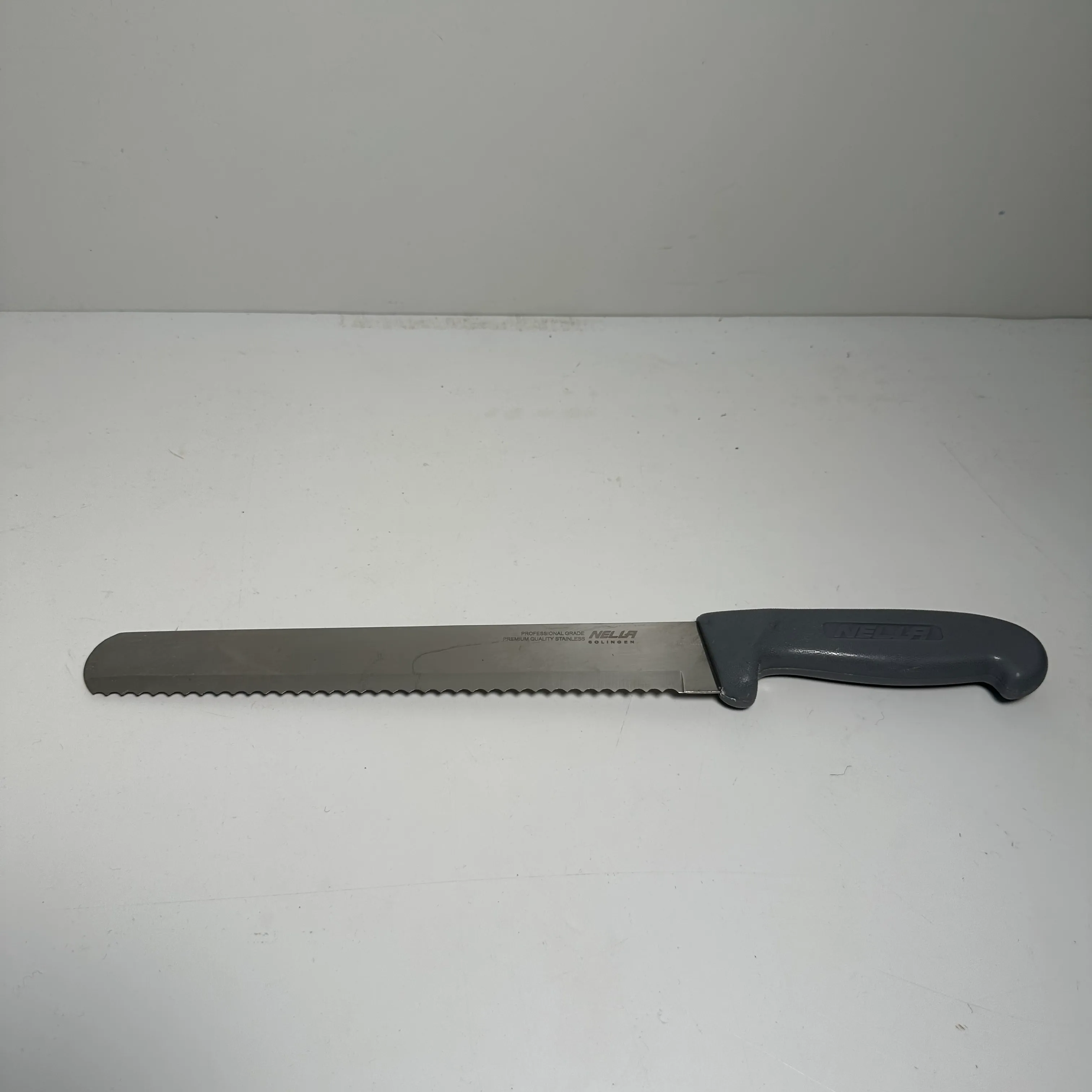 Knife - Serrated - Black Handle