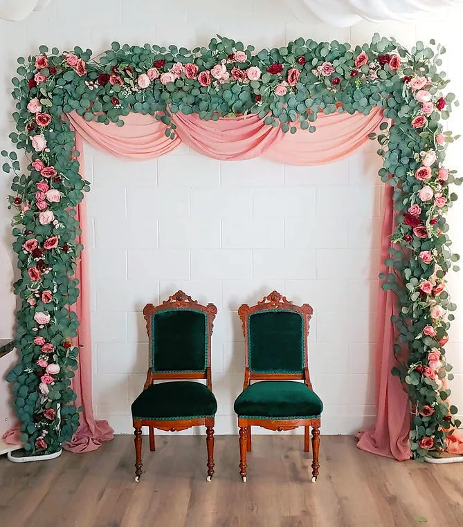 White Metal Arch with Eucalyptus and Floral Arch
