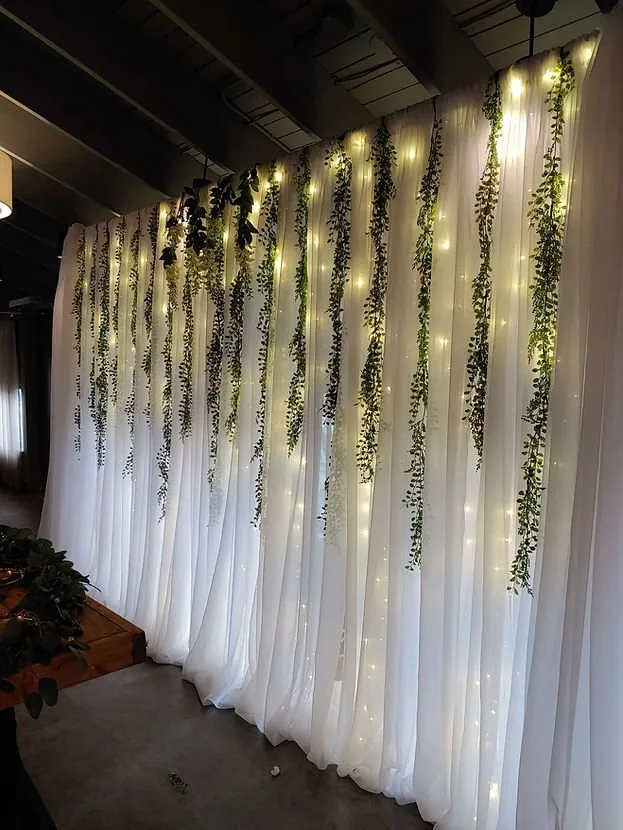 Fairylight Backdrop with Hanging Greenery