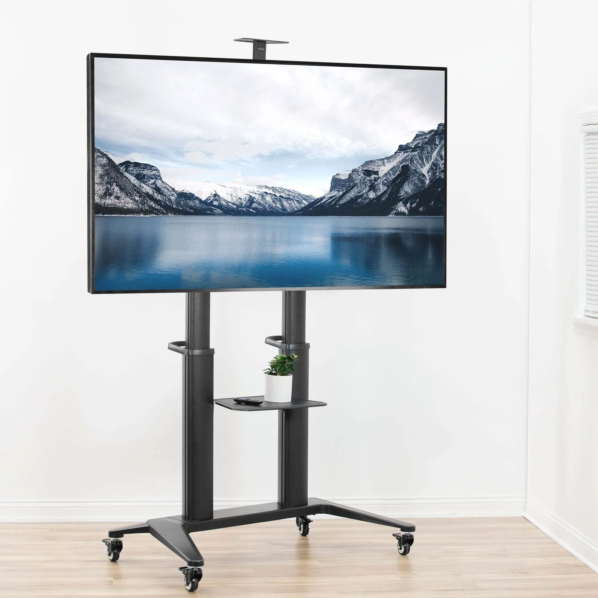 Samsung 85" TV on rolling stand