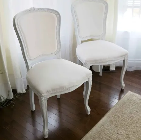 Elegant dining chairs in the Louis XVI style