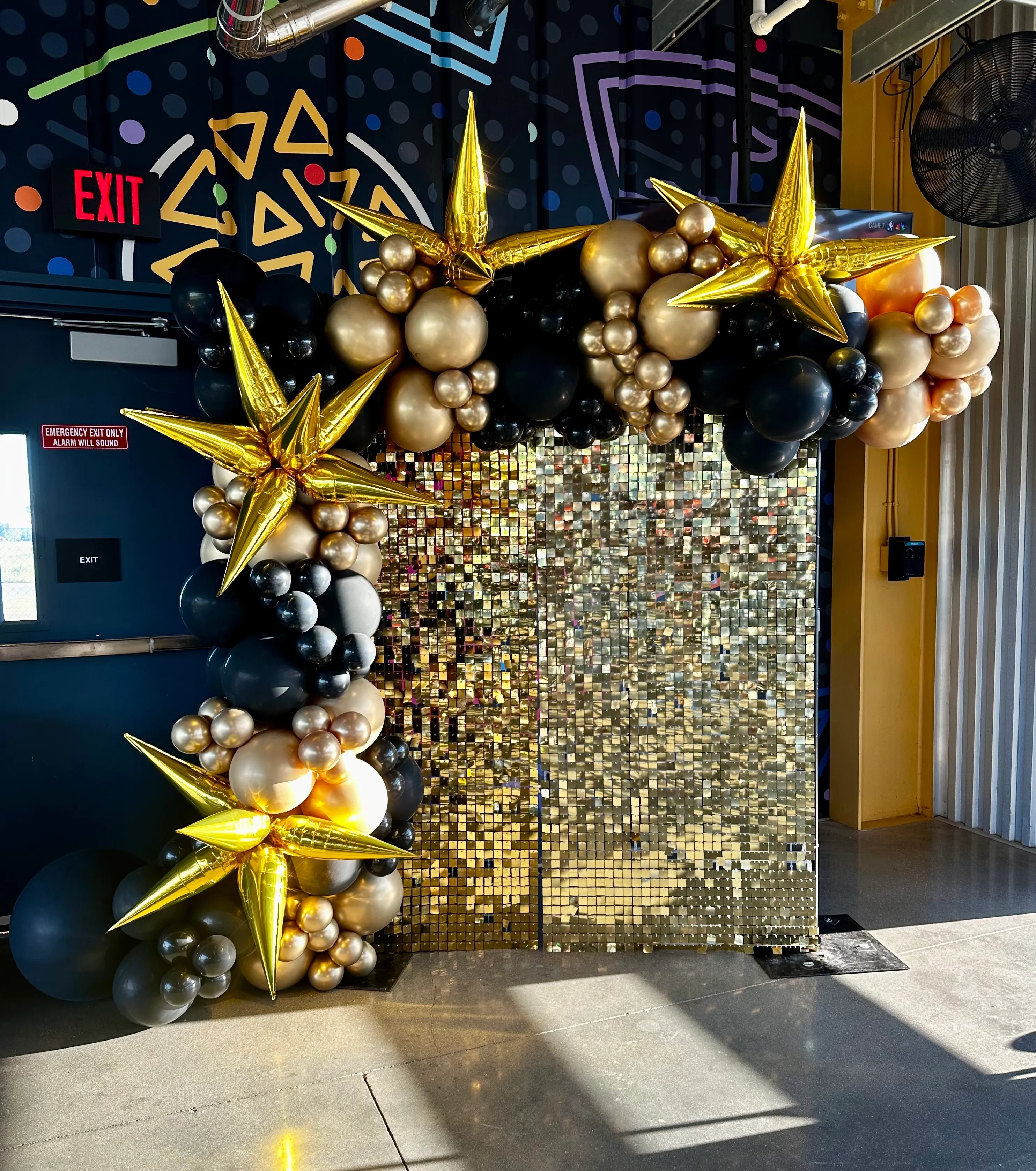 Gold Shimmer Wall with Balloons