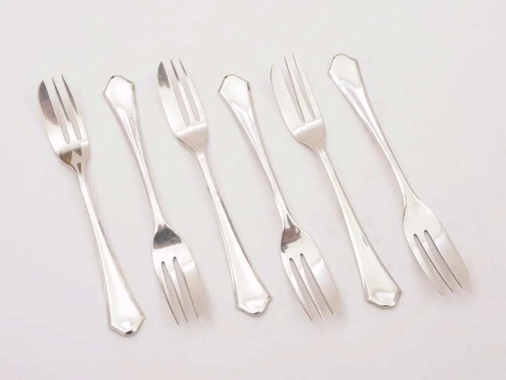 Silver ornate polished cake fork
